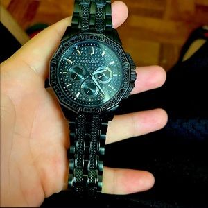 It’s a black bulova men’s watch 98C134 - C9601439.